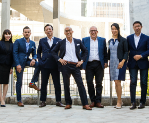 real estate agents posing outdoors