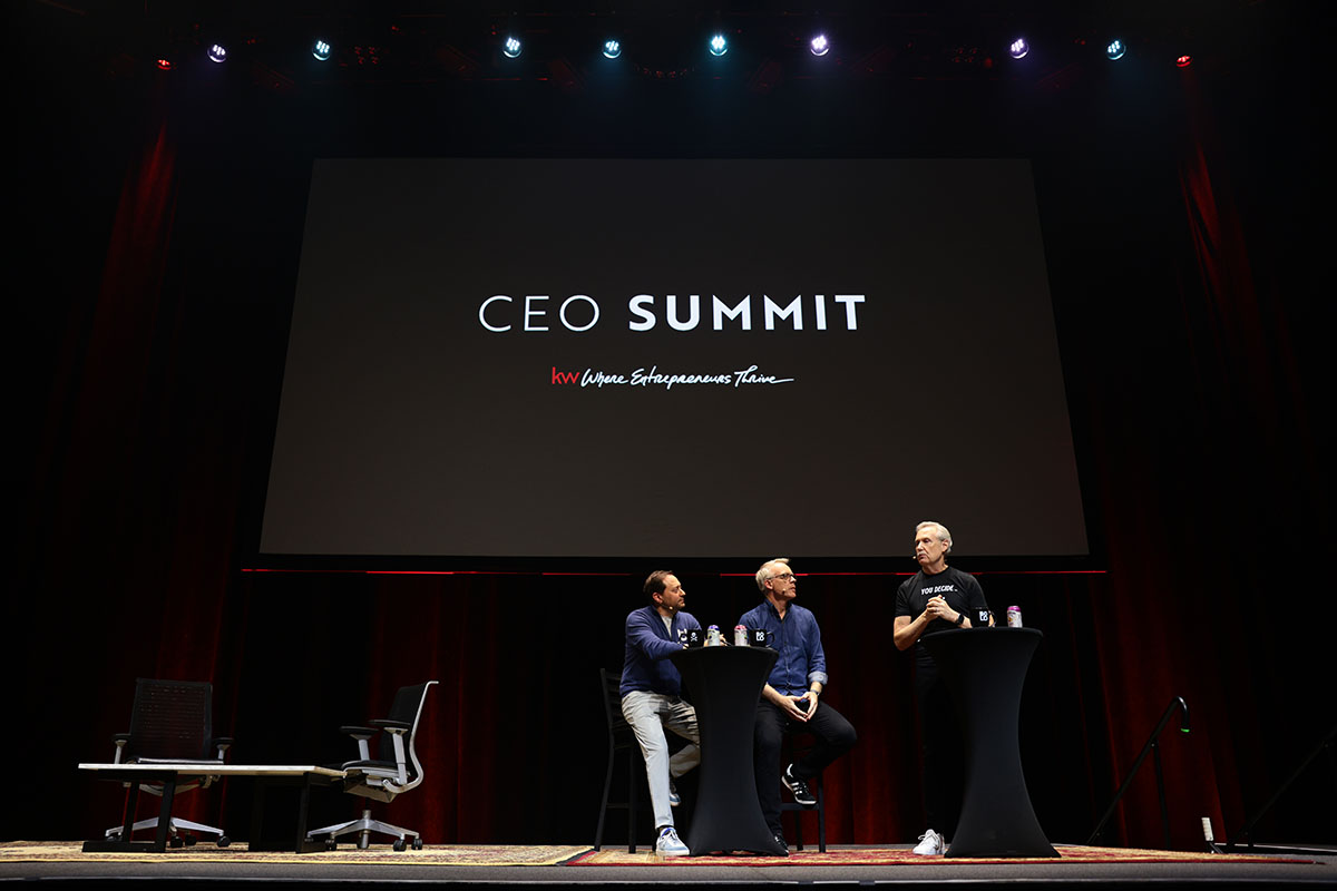 Gary Keller, Jason Abrams, and Jay Papasan on stage at CEO Summit during Mega Agent Camp 2024.